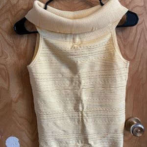 Sleeveless yellow sweater